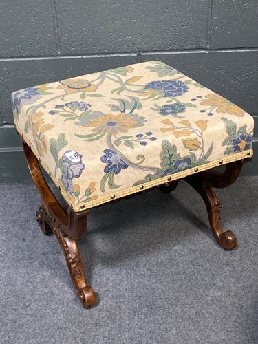 Lot 667 - A 19th century walnut X-framed stool with...