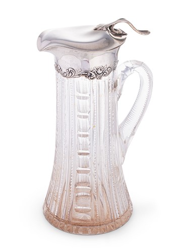 Lot 510 - An early 20th century American metalwares silver topped cut glass cordial jug