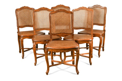 Lot 580 - A set of six Louis XV caned side chairs
