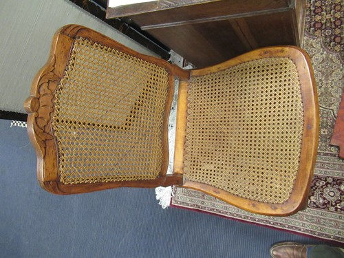 Lot 580 - A set of six Louis XV caned side chairs
