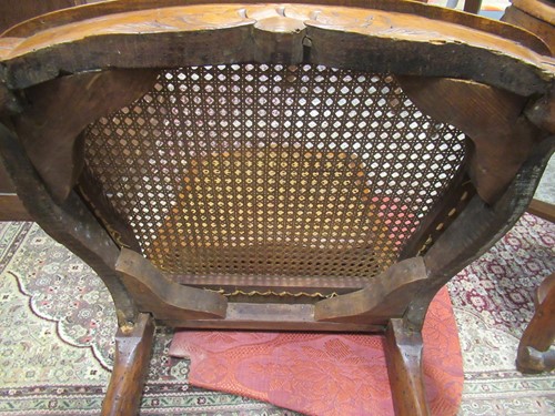 Lot 580 - A set of six Louis XV caned side chairs