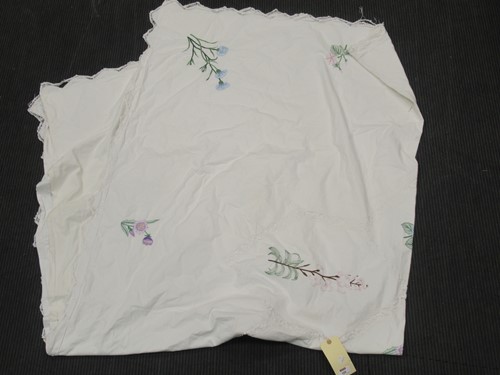 Lot 155 - A large embroidered and lace bedspread, 260 x...