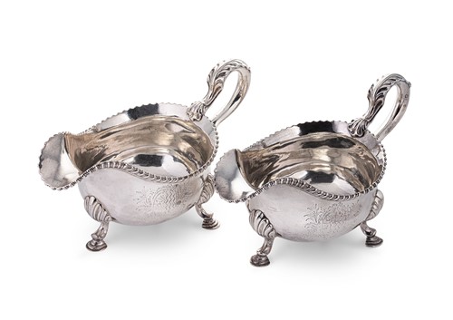 Lot 532 - A pair of George II silver sauce boats