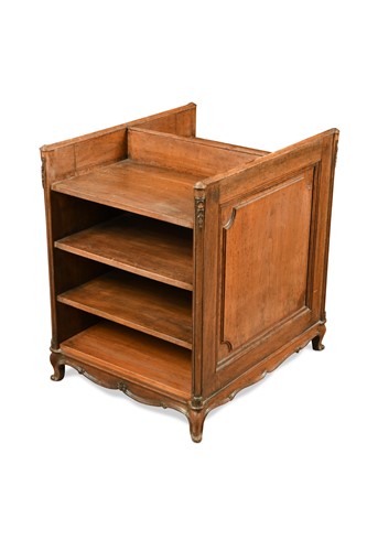 Lot 592 - A French walnut double sided book shelf, 19th century