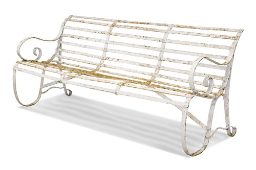 Lot 666 - A white painted wrought iron garden bench, late 19th century