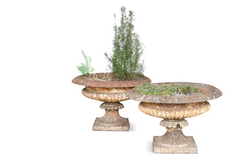 Lot 665 - A pair of cast metal garden urns, early 20th century
