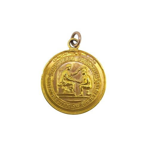 Lot 129 - A 9ct gold Northern Counties Amateur Swimming Association medallion