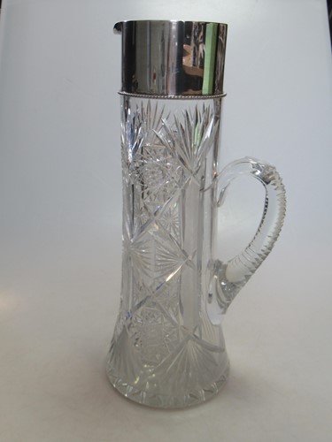 Lot 256 - Silver topped glass jug