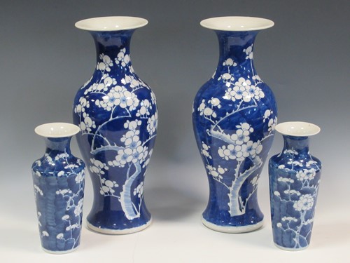 Lot 21 - A pair of Chinese blue and white baluster...