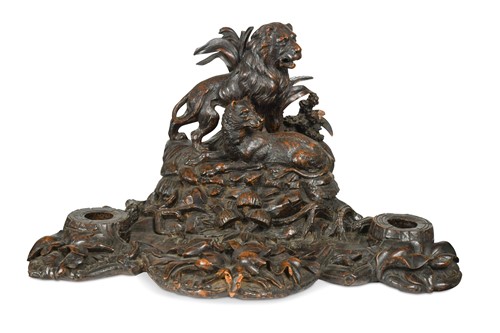 Lot 705 - A Black Forest carved wood desk stand, late 19th century