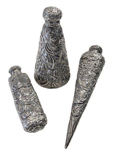 Lot 434 - A set of three Victorian silver perfume containers