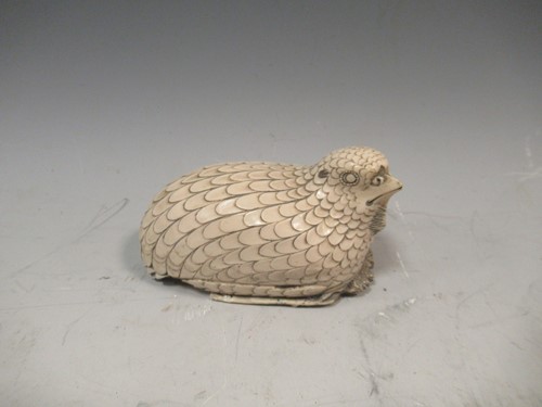 Lot 111 - A resin model of a partridge, 6 x 10cm