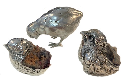 Lot 446 - Two silver novelty pin cushions, mark of Sampson Mordan, together with a novelty pepperette