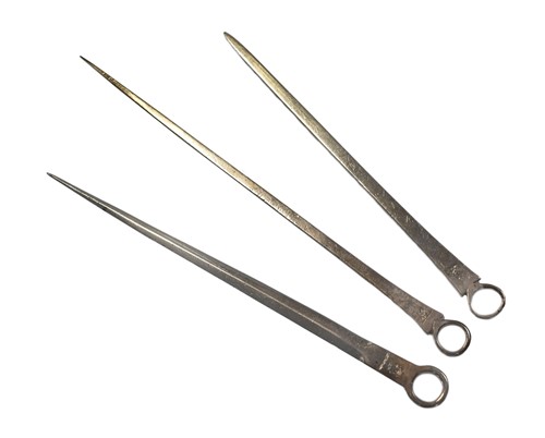 Lot 541 - A trio of George III silver meat skewers