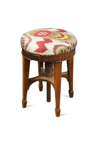 Lot 501 - A mahogany piano stool upholstered in Uzbek fabric, early 19th century