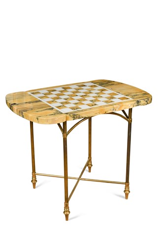 Lot 615 - A marble top brass games table, 20th century