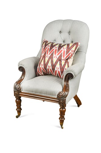 Lot 483 - A William IV mahogany button back armchair