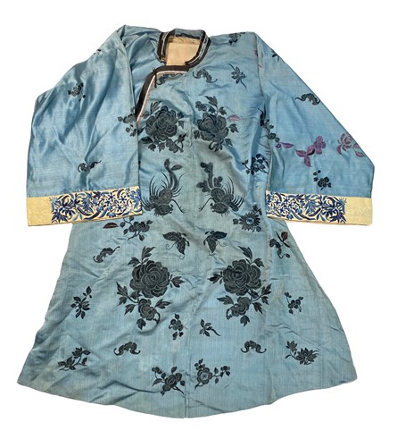 Lot 145 - A Chinese pale blue silk and embroidered woman's summer jacket, circa 1900