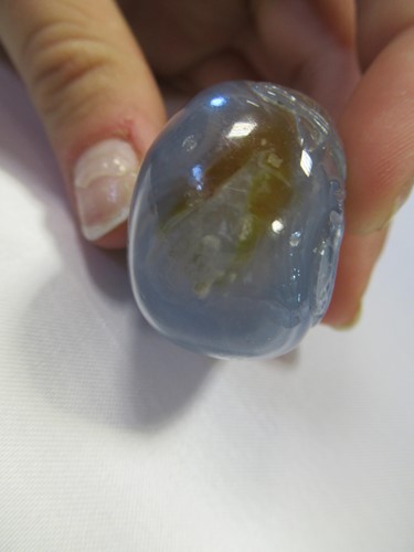 Lot 165 - A Chinese greenstone snuff bottle, early 20th century