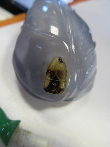 Lot 165 - A Chinese greenstone snuff bottle, early 20th century