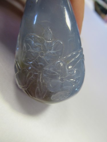 Lot 165 - A Chinese greenstone snuff bottle, early 20th century