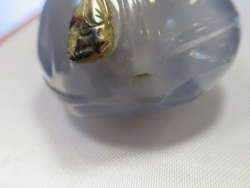 Lot 165 - A Chinese greenstone snuff bottle, early 20th century