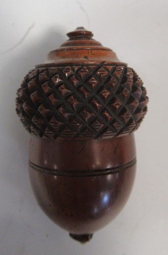 Lot 146 - An 18th century carved coquilla nut nutmeg...