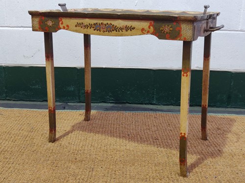 Lot 554 - A painted folding tray table 55 x 73 x 45cm