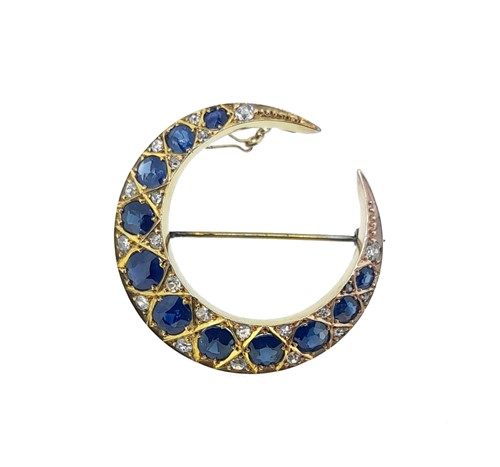 Lot 187 - A sapphire and diamond crescent brooch