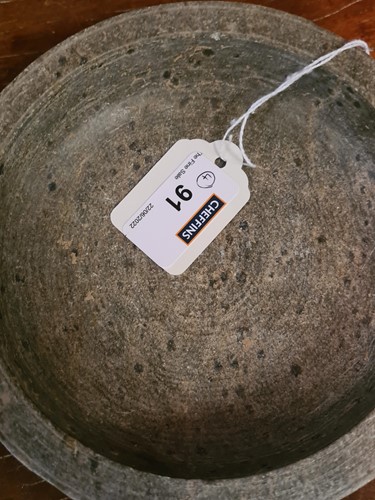 Lot 91 - A Chinese green puddingstone tripod small vase, perhaps Tang Dynasty