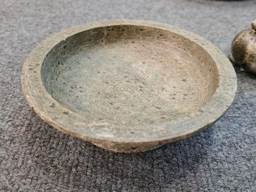 Lot 91 - A Chinese green puddingstone tripod small vase, perhaps Tang Dynasty
