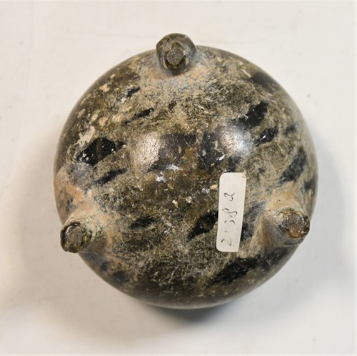 Lot 91 - A Chinese green puddingstone tripod small vase, perhaps Tang Dynasty