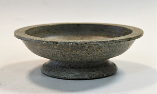 Lot 91 - A Chinese green puddingstone tripod small vase, perhaps Tang Dynasty
