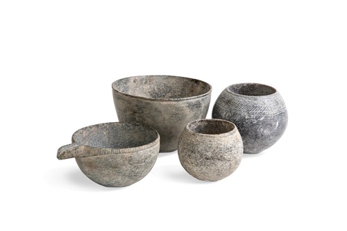 Lot 93 - Four Chinese grey stone vessels, perhaps Han Dynasty