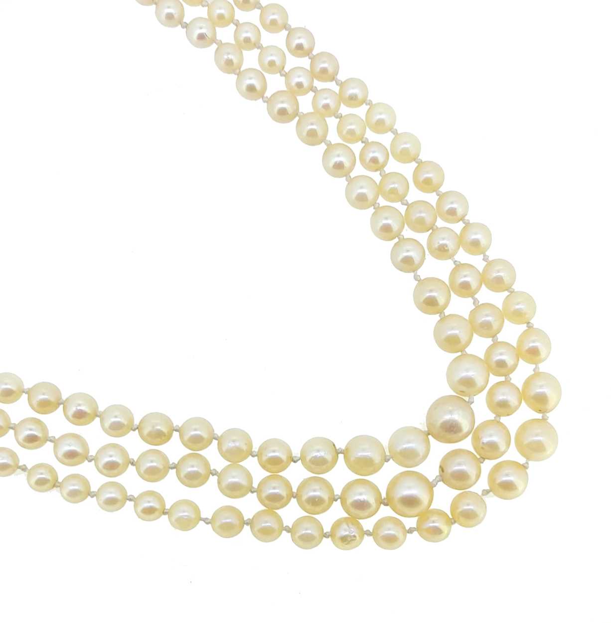 Lot 22 - A three strand cultured pearl necklace