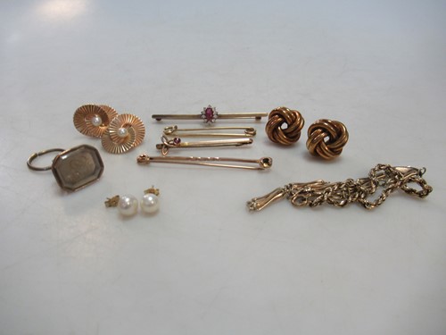 Lot 232 - Four brooches, togeher with a pair of knot...
