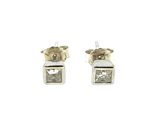 Lot 231 - A pair of princess cut diamond ear studs