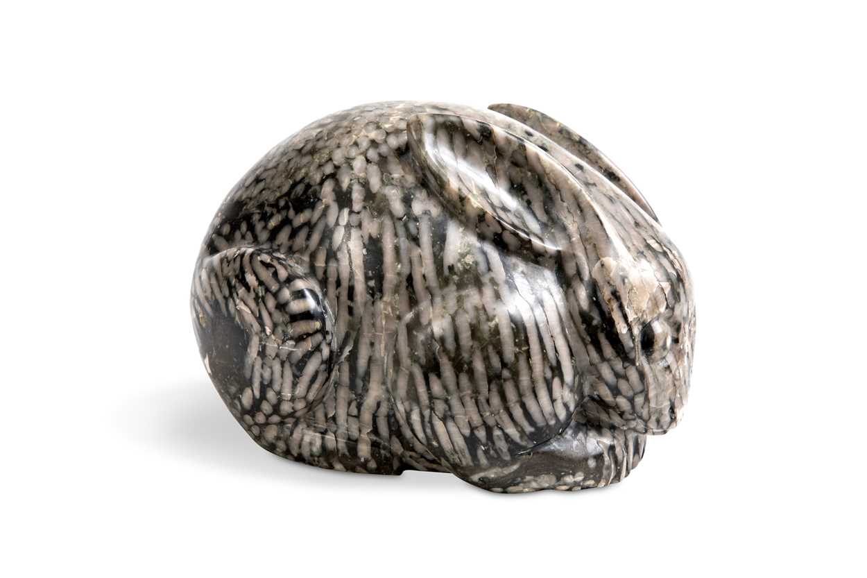 Lot 96 - A Chinese green pudding stone marble crouched hare, in Tang Dynasty style
