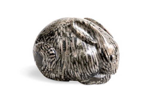 Lot 96 - A Chinese green pudding stone marble crouched hare, in Tang Dynasty style