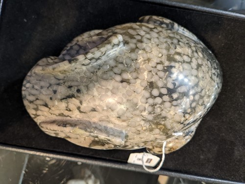Lot 96 - A Chinese green pudding stone marble crouched hare, in Tang Dynasty style