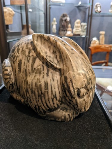 Lot 96 - A Chinese green pudding stone marble crouched hare, in Tang Dynasty style