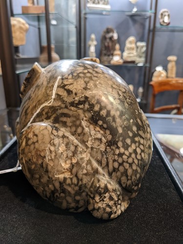 Lot 96 - A Chinese green pudding stone marble crouched hare, in Tang Dynasty style