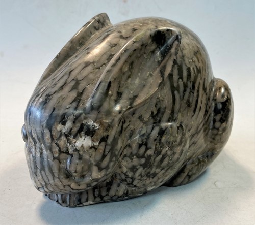 Lot 96 - A Chinese green pudding stone marble crouched hare, in Tang Dynasty style