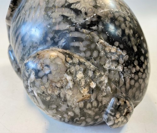 Lot 96 - A Chinese green pudding stone marble crouched hare, in Tang Dynasty style