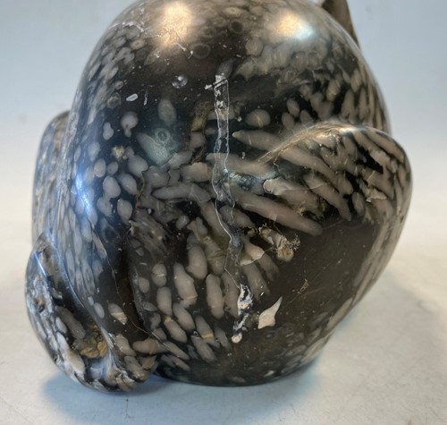 Lot 96 - A Chinese green pudding stone marble crouched hare, in Tang Dynasty style