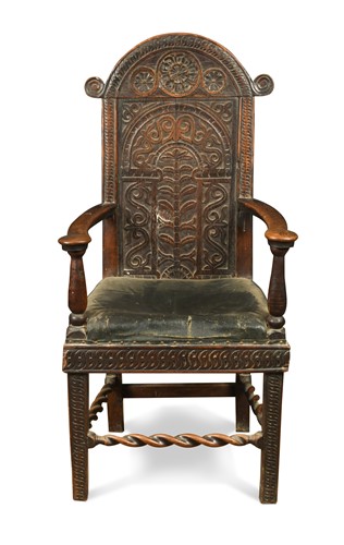 Lot 590 - A 17th century and later oak chair elbow chair