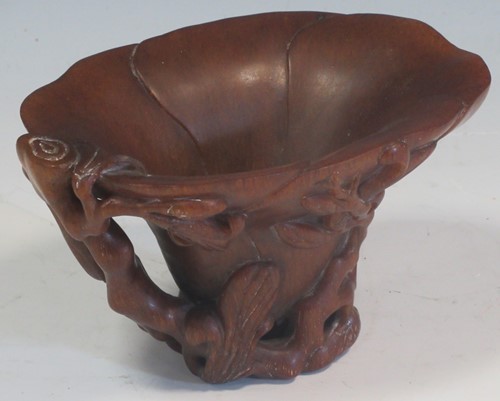 Lot 56 - A Chinese resinous libation cup, with...