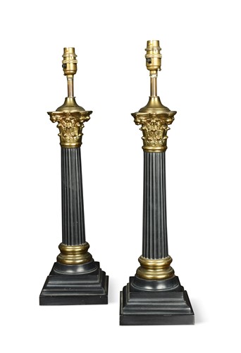 Lot 525 - A pair of cast metal Corinthian column table lamps, 20th century