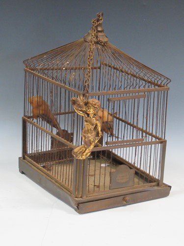 Lot 34 - An early 20th century Genykage bird cage,...