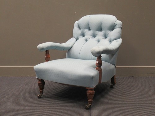 Lot 486 - An Edwardian walnut armchair with blue button...